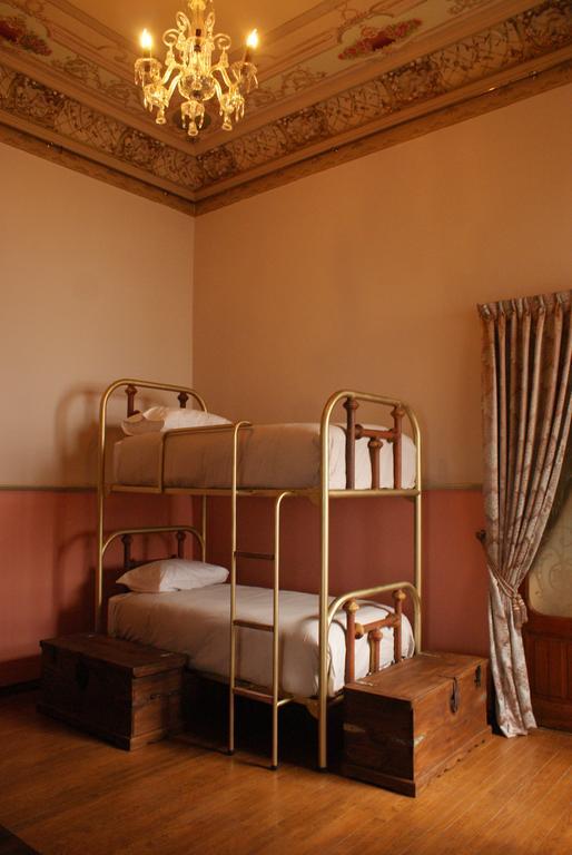 Leonora Hostal Puebla Rum bild